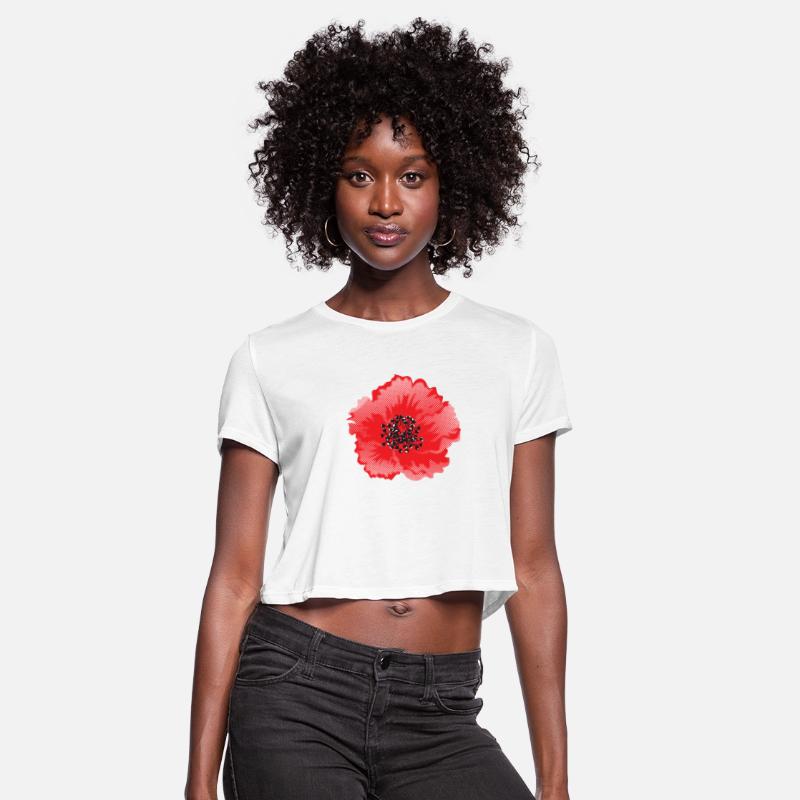 a red flower with a black center on a black
